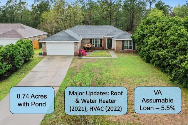 4754 Balboa Rd, Crestview, FL 32539 - ranch-style home with concrete driveway, a front yard, and a garage