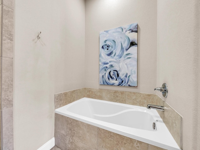 bathroom featuring a garden tub