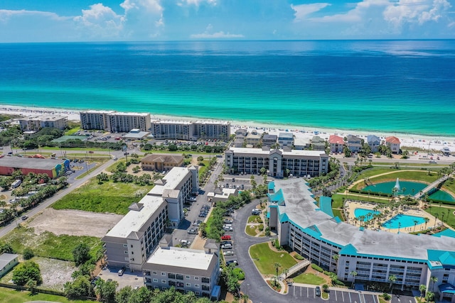 bird's eye view with a view of the beach and a water view