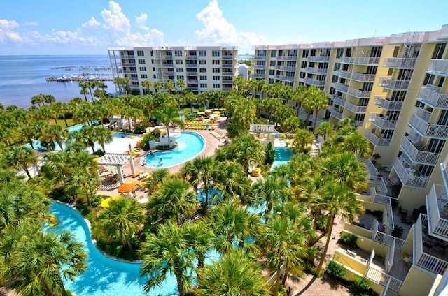 view of swimming pool with a water view