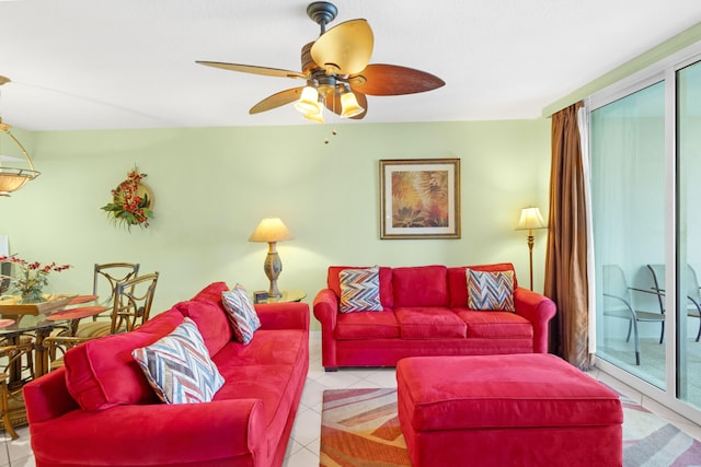 tiled living room with ceiling fan