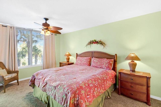 bedroom featuring carpet, baseboards, and ceiling fan