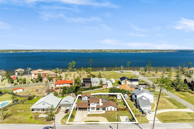 aerial view featuring a residential view and a water view