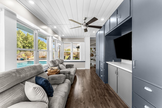 living area with dark wood finished floors, recessed lighting, wood ceiling, and ceiling fan