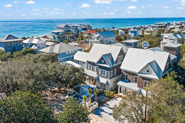 aerial view with a residential view and a water view