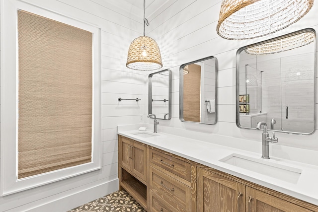 bathroom featuring double vanity and a sink