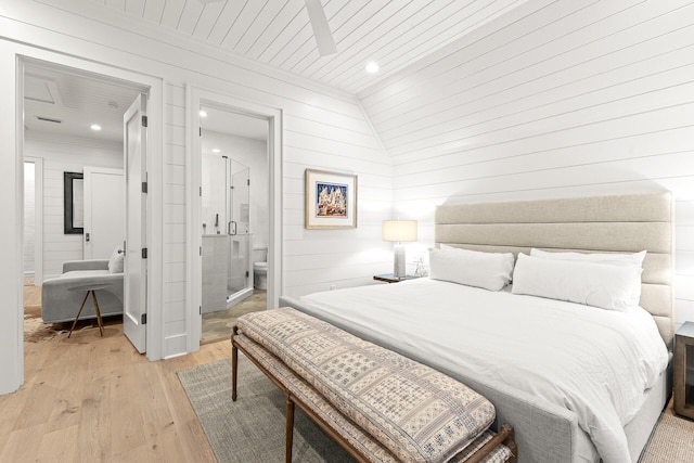 bedroom featuring light wood finished floors, recessed lighting, wooden ceiling, and ensuite bathroom