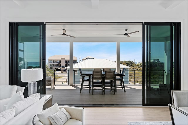 interior space featuring a ceiling fan and wood finished floors