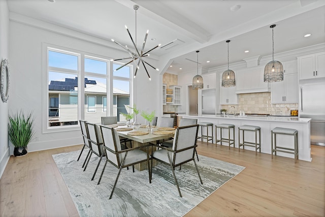 dining area with baseboards, beam ceiling, recessed lighting, an inviting chandelier, and light wood-style floors