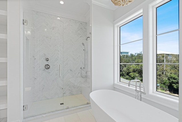 full bathroom featuring crown molding, a freestanding bath, recessed lighting, a stall shower, and tile patterned floors