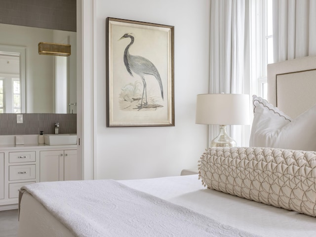 bedroom featuring a sink