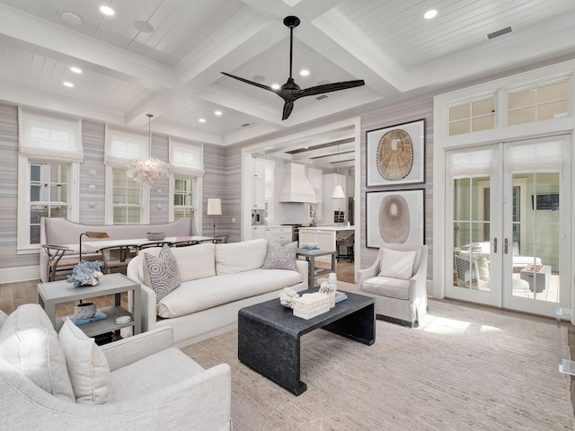 living room with beam ceiling, french doors, recessed lighting, and coffered ceiling