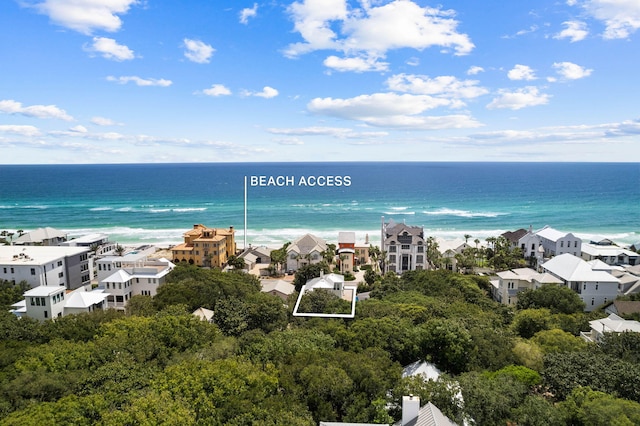 property view of water featuring a beach view