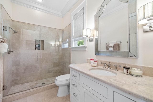 full bath with tile patterned flooring, toilet, ornamental molding, a stall shower, and vanity