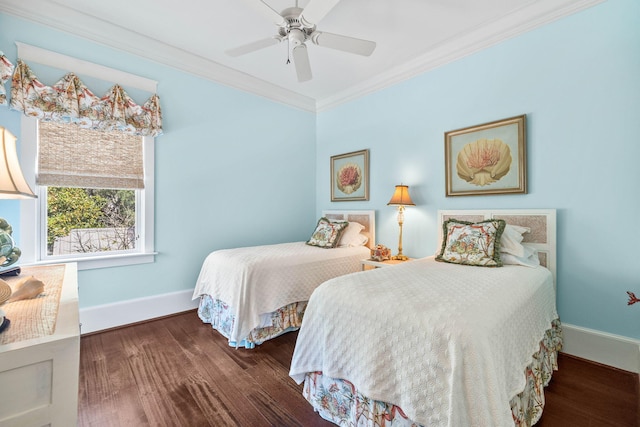 bedroom featuring ceiling fan, baseboards, wood finished floors, and crown molding