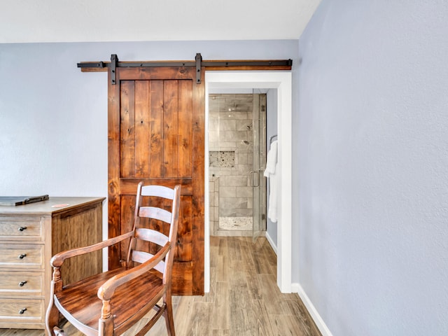 interior space featuring baseboards and light wood-style floors