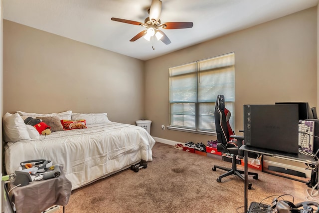 bedroom with baseboards, carpet, and a ceiling fan