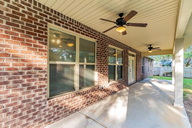 view of patio / terrace featuring a ceiling fan and fence