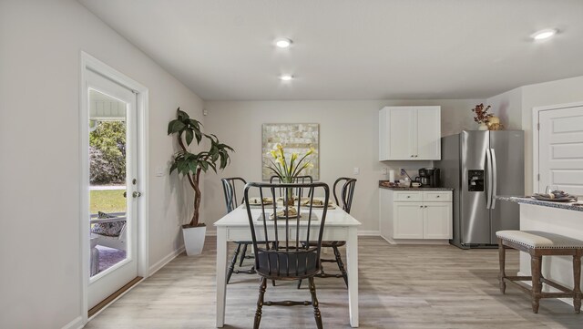 217 Eunola Ln, Freeport, FL 32439 - dining area with baseboards, light wood-type flooring, and recessed lighting