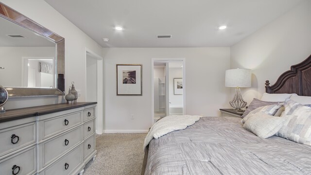 217 Eunola Ln, Freeport, FL 32439 - bedroom featuring recessed lighting, connected bathroom, visible vents, baseboards, and light colored carpet