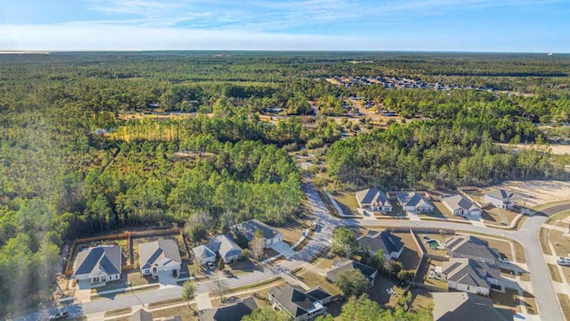 217 Eunola Ln, Freeport, FL 32439 - drone / aerial view featuring a residential view and a wooded view