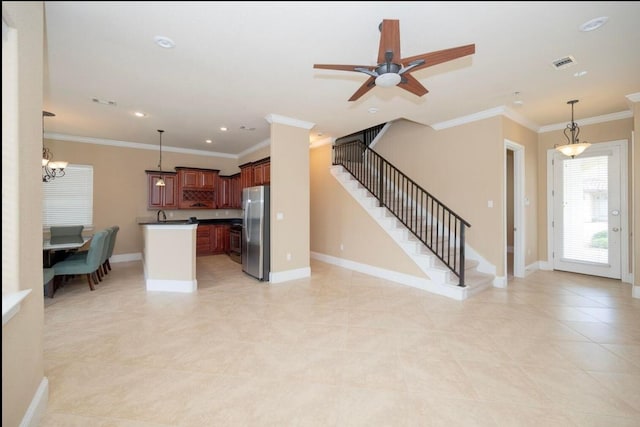 living room with visible vents, baseboards, stairs, and crown molding