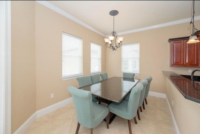 dining room with baseboards, an inviting chandelier, ornamental molding, and light tile patterned flooring