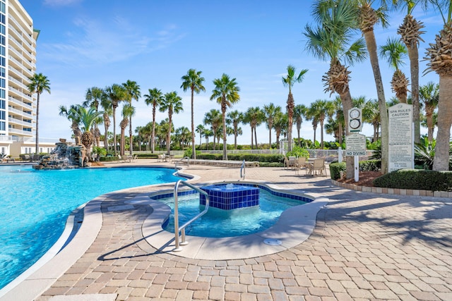 community pool with a patio