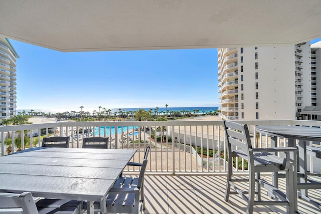 balcony featuring a water view