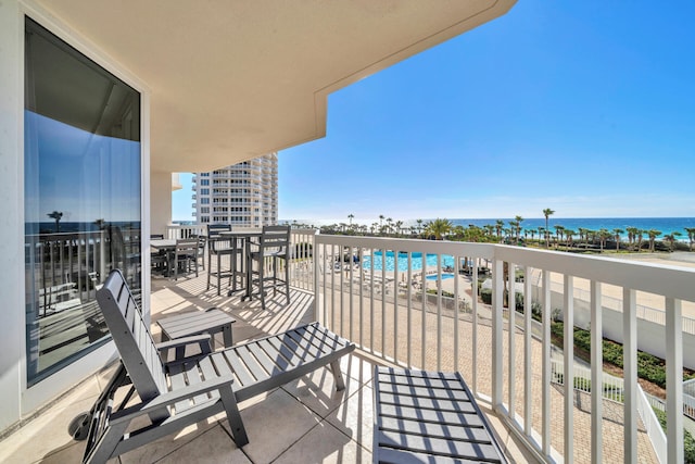 balcony featuring a water view