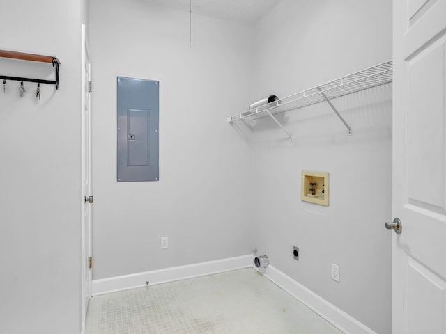 clothes washing area featuring hookup for a washing machine, baseboards, laundry area, electric panel, and electric dryer hookup