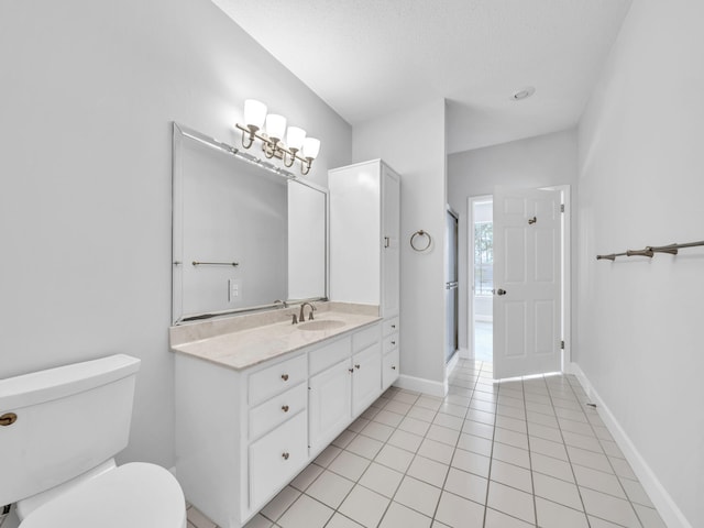 full bath featuring tile patterned flooring, toilet, vanity, and baseboards