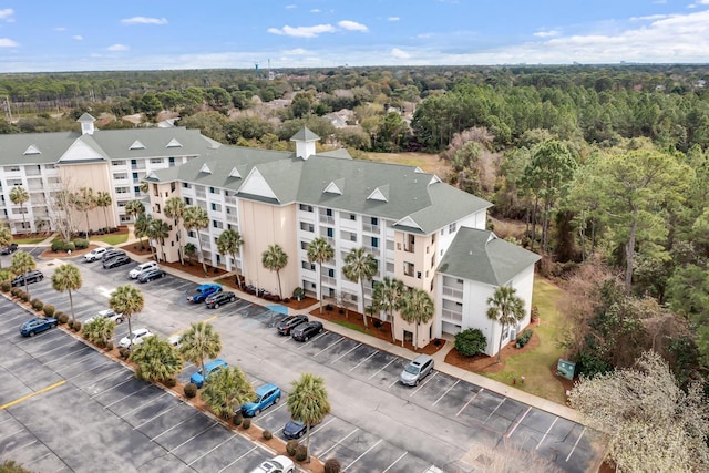 drone / aerial view with a view of trees