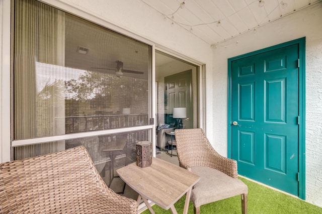 entrance to property with visible vents and stucco siding