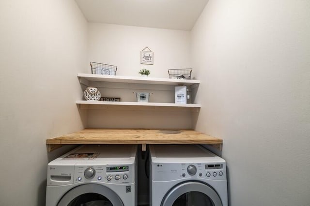 laundry room featuring laundry area and washing machine and dryer