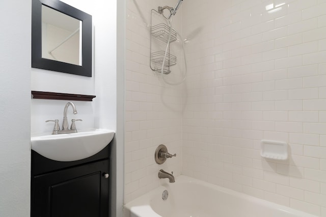 bathroom featuring shower / bath combination and vanity