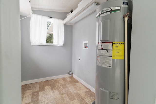 washroom featuring baseboards, water heater, laundry area, hookup for a washing machine, and hookup for an electric dryer