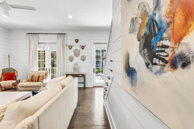 living room with recessed lighting, a ceiling fan, and dark wood-style flooring