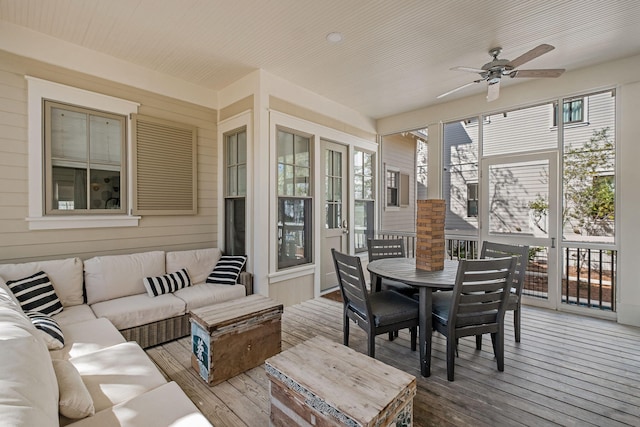 sunroom / solarium with wood ceiling and ceiling fan