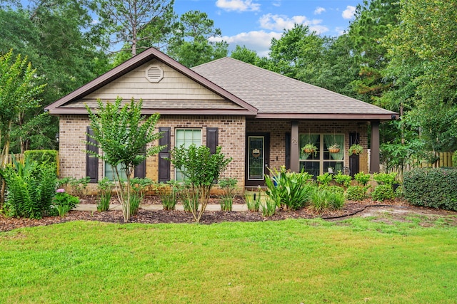 22 Camellia Ct, Freeport, FL 32439 - single story home featuring a front yard, brick siding, and a shingled roof