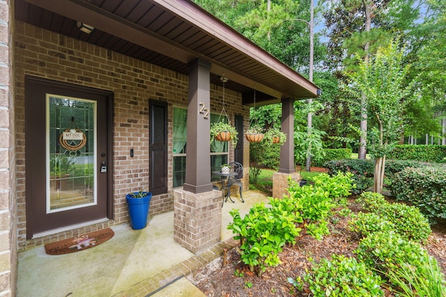 22 Camellia Ct, Freeport, FL 32439 - entrance to property with brick siding and covered porch