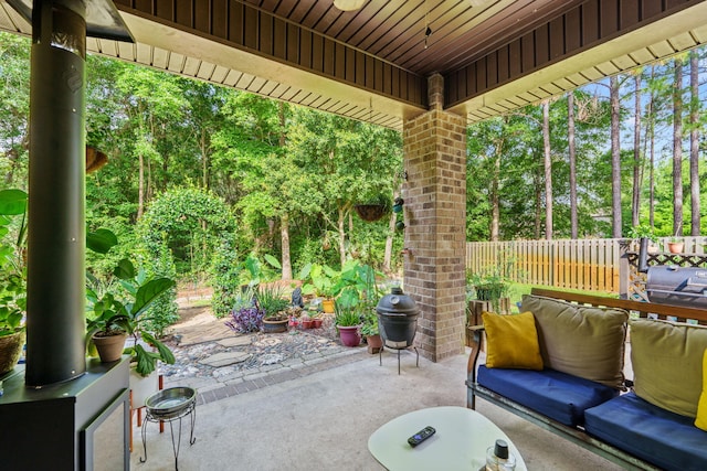 22 Camellia Ct, Freeport, FL 32439 - view of patio / terrace with view of wooded area