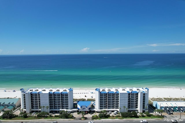 bird's eye view with a beach view and a water view