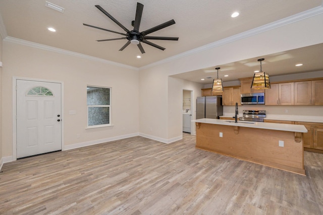 kitchen with light countertops, light wood-style floors, visible vents, and appliances with stainless steel finishes