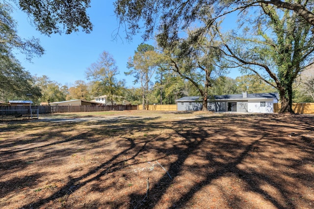 view of yard with fence