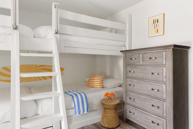 bedroom featuring wood finished floors