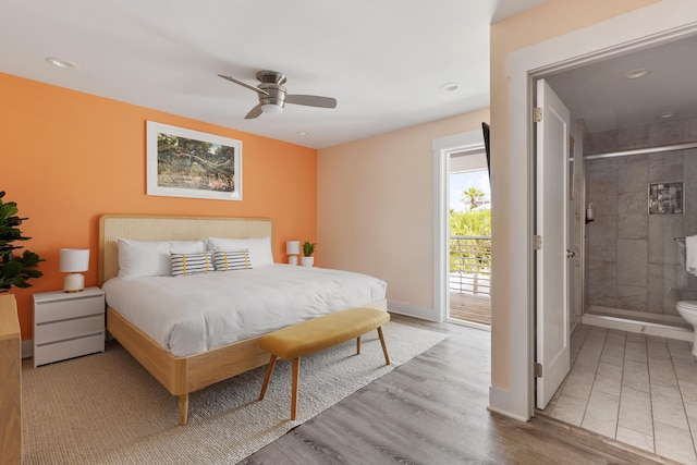 bedroom featuring recessed lighting, ensuite bath, baseboards, and wood finished floors