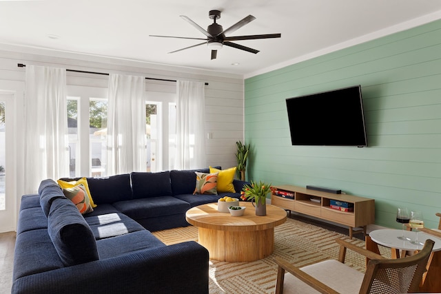 living area with ceiling fan