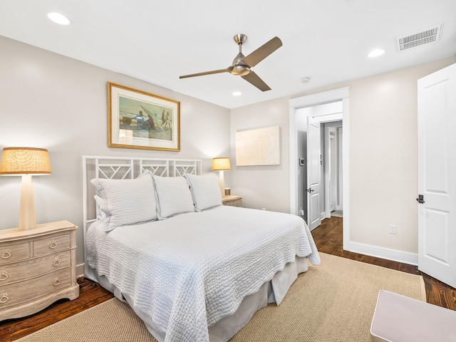 bedroom featuring recessed lighting, wood finished floors, and visible vents