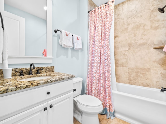 full bathroom featuring vanity, shower / bath combination with curtain, toilet, and tile patterned flooring